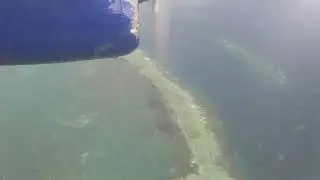 Flying Solomon Airlines with Paul Bodnar in Munda Lagoon, Western Province Solomon Islands.