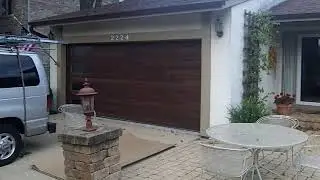 chi 2347 accents walnut planks garage door with etched insulated glass