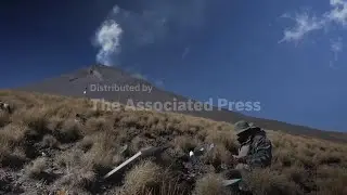 Scientists climb Mexico's Popocatepetl volcano to study its volatile activity