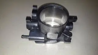 Polishing the throttle body after machining it to 70mm for performance. Step 2