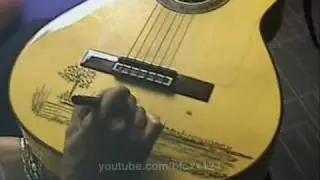 Canut Painting and signing my Guitar Enamorado Soy