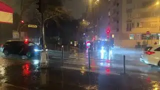 Pluie. Croisement rue de Crim&eacute;e et rue Botzaris, Paris 19e. Vendredi 1er mars 2024 &agrave; 19h33.