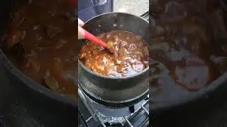 Guinness stew in cauldron