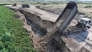Great Work!! Machinery Filling Land And Repair a Land Slide Near The Lake
