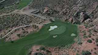 aerial shot of desert golf course high altitude