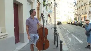 Waltz on the balcony: in Paris, cellist plays for his neighbours | AFP