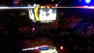 On the Rocks sings the National Anthem at the first basketball game at Matt Arena