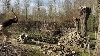 Splitting Firewood With An Axe