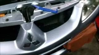 05 Mitsubishi Lancer Evo headlight bulb replacement shortcut