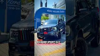Ranger Sport in dark gray, fully customized with a 1-inch lift kit, front flush with rear, stylis...