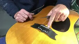 Acoustic guitar bridge crack repair on an old Gibson, etc...