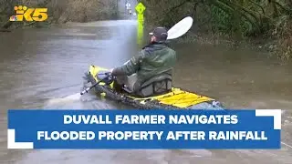 Duvall farmer navigates flooded farm after historic rainfall