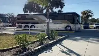 Two Silver Eagle Buses pulling in..
