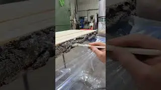 Using Designer epoxy to stabilize cracks and bark on this table top & bench.