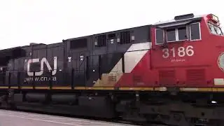 2 trains CN 2269 CN 2524 EB & CN 3186 all autoracks WB through Hobson Yard Sarnia Ontario 2/14/2022
