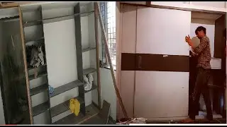 Granite wardrobe with sliding wooden door.