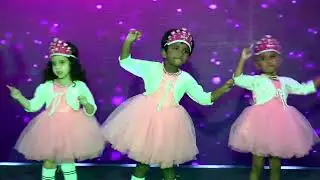 A catchy, cheerful carnival tune begins, Our play group childrens for their amazing performance