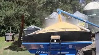 empty grain bin of corn and combine rye