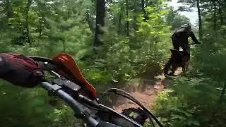 Rooster Cam Footage of Liam riding a Surron Ultra Bee on Calabogie Single Track
