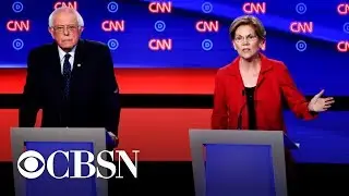 Warren and Sanders defend liberal vision on first night of Detroit debates