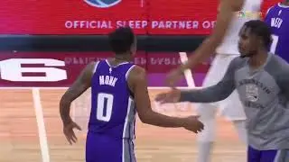 Malik Monk monster block on Allen which leads to Mike Brown pushing Monk into hitting 3 on offense
