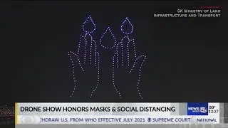 Spectacular drone light show with coronavirus theme