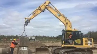 Hijsen met grondverzetmachines