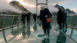 Glass bridge cracks from rock falling.