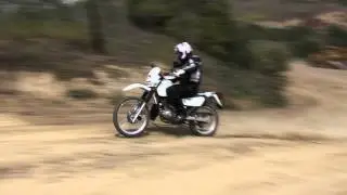 The 2013 Suzuki DR200SE in the dirt.