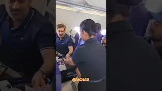Air Hostess gifts MS Dhoni chocolates
