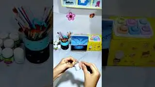 Diy show piece with wooden sticks and empty paint bottle #diy #craftideas