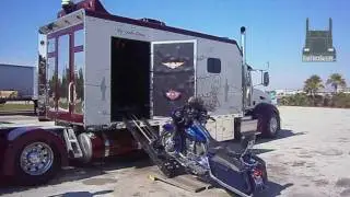 Custom Peterbilt with its own Harley-Davidson Garage SemiTruckGallery.com