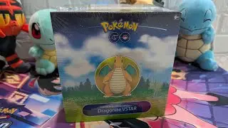 Lad opens Pokemon Go TCG Dragonite V-Star premier deck holder collection 
