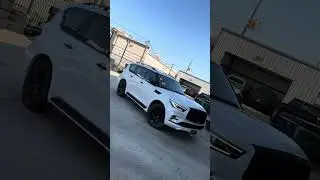 AWT - Blackout 2023 Infiniti QX80 Red Painted Calipers on 22x9.5 Niche Vice Wheels in Gloss Black