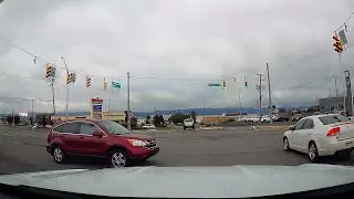 Car Runs Red Light in Front of Police || ViralHog