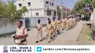 Police conduct flag march in Asifabad to ensure peaceful municipal elections.