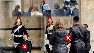 RUDE IDIOT! Two king’s guard WARNS them as they step to the limits