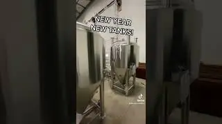 Unloading and Delivering Stainless Steel Fermenters, Brite Tanks and Serving Tanks at a Brewery