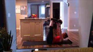 How To: Medicine Ball Toe-Tap Crunch