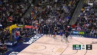 Kyle Kuzma makes a wild 3/4 court shot just after the buzzer - ball bounce high in the air and lands