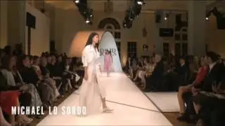 Model trips on her dress during Michael Lo Sordo's Spring 2014 fashion show