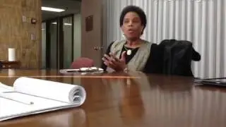 Enola Aird , founder of the Community Healing Network, speaks to the New Haven Register