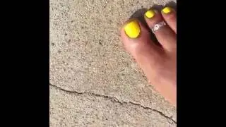 Alexis, toesofalexis crushing little ants with your pretty bare foot, in yellow toe nail
