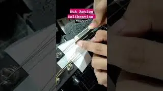 Calibrating the Nut using File to lower the String Action and give you Comfort on pressing the Frets