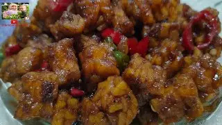 masak tempe kecap potong dadu rasanya enak,manis,gurih dan gak ribet cara buatnya....