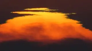 Distorted sun over fog