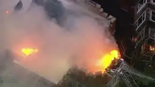 Hyde Park apartment building roof collapses amid heavy flames