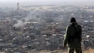 Kurdish forces discover two mass graves after freeing Iraqi town from ISIL control