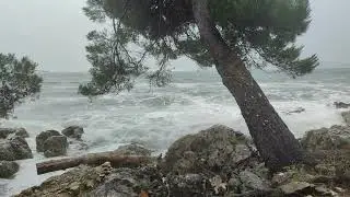 Relaxing heavy gust winds, sea waves and rain drops in thunderstorm