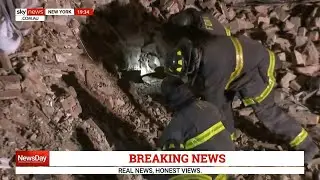 Rescue crews search through rubble after NYC building collapse